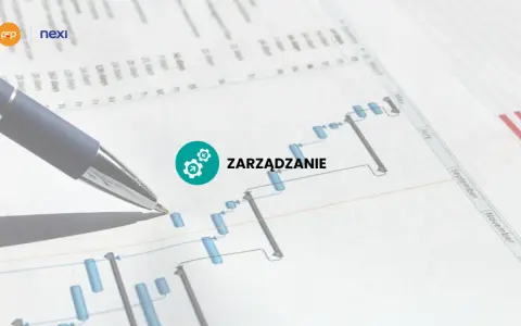 Długopis nad wykresem Gantta, symbolizującym zarządzanie projektem i operat szacunkowy.