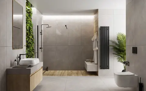 Nowoczesna łazienka z zieloną ścianą i betonem architektonicznym. Mikrocement na płytki nadaje jej surowego, ale eleganckiego charakteru.