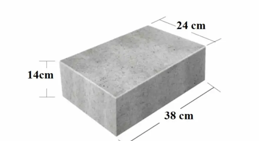 Szary bloczek betonowy o wymiarach 38x24x14 cm. Zastanawiasz się, ile waży bloczek betonowy?